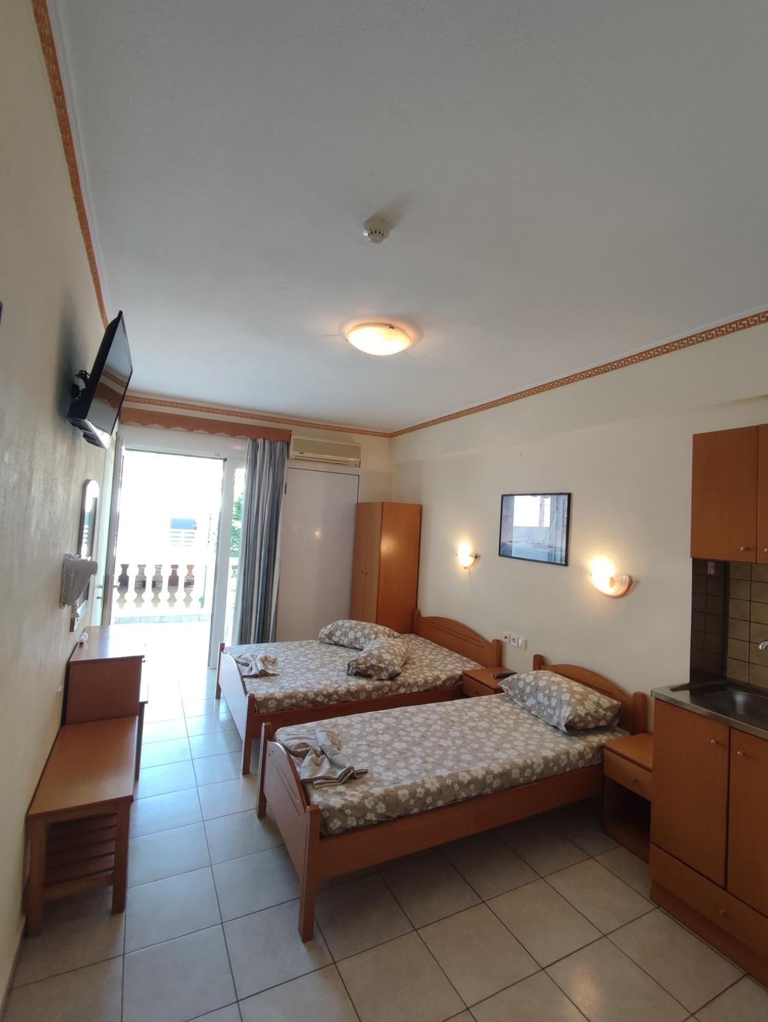 Villa Cosmos Inn Olympiakí Aktí Esterno foto